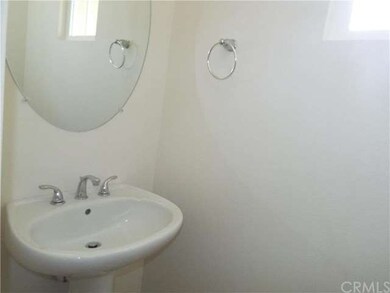 1/2 Bath with pedestal sink.