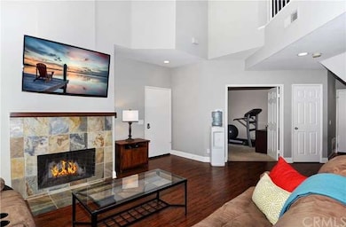 Living Room with Slate Fireplace and Vaulted Ceili