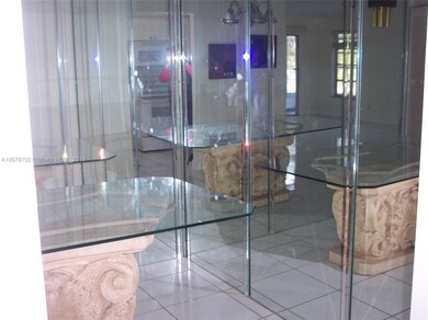 CUSTOM MIRROR GIVES SUPER VIEW OF DINING AREA.  LOVELY TABLE STAYS.