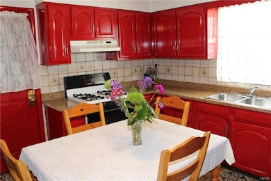 Bright window and door leading to back entrance an