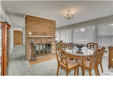 Dining Room Area - 2 sided open wood burning firep