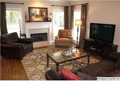 This warm and inviting family room is open to the 