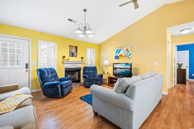 Living room with hardwood / wood-style floors, cei