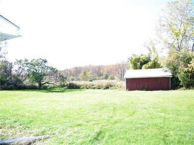 The 3 stall barn is behind the house, and check ou