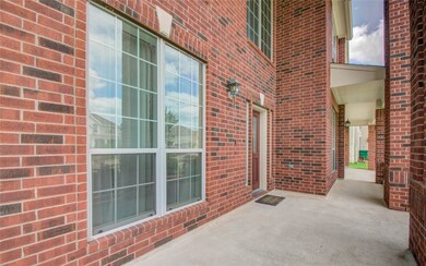 Alternate side view of extensive front patio