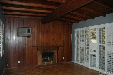 Family Room With Wood Paneling, Wood Burning Firep