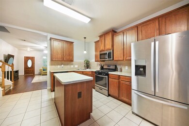 Another shot of this great kitchen, and look into the living room.