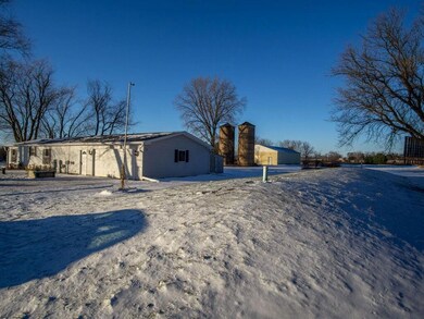 The home is serviced by a drilled well and a mound