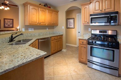 So much natural light shinning through while looking out on to the golf course.  Granite counter tops, stainless appliances all in like new condition!