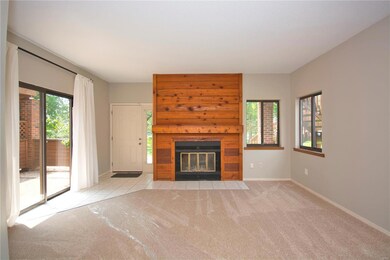 Large living room with woodburning FP.
