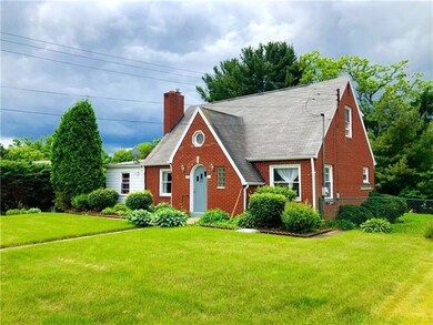 This 3 bedroom/ 1.5 bath brick home is nestled on 