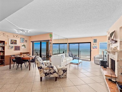 Living room and dining room looking out to the ocean