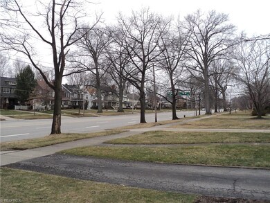 Beautiful street scene of Clifton Blvd with all its mature trees and classic homes.
