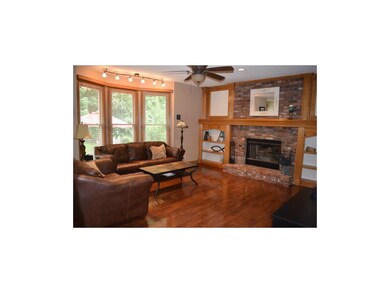 Spacious living room with hardwood floors!