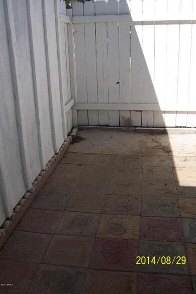 wood fence enclosed patio