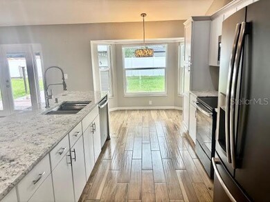 7144 Remington Oaks Loop, Lakeland, FL 33810 - photo 6