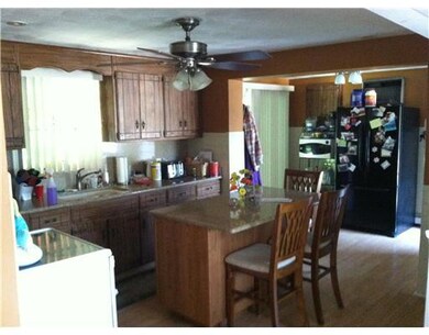 Kitchen. Newer granite counters and flooring. Slid