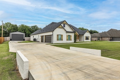 Extended driveway to side entry garage and large w