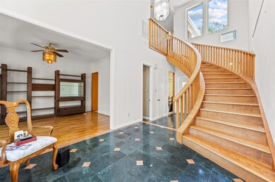 This home features a spacious entryway with a stri