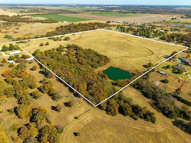 west View of rural area featuring property boundaries highlighted and a large body of water