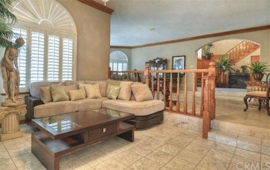 Cozy conversation area off living room with firepl