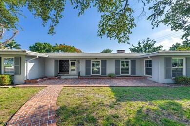 View of front of home featuring a front yard and a