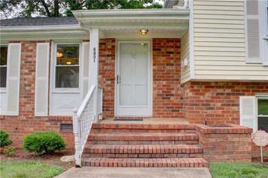FRONT PORCH: This home is accented by a 2011 Archi