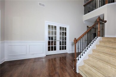 The study/living room offers privacy with French d