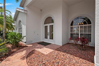 Doorway to property featuring french doors