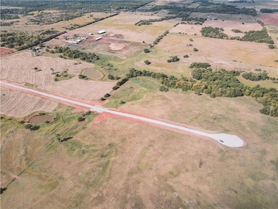 Aerial view of property's location featuring rural landscape