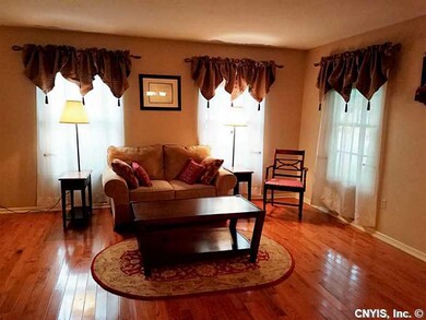 Living Room. Spacious living room with gleaming wo