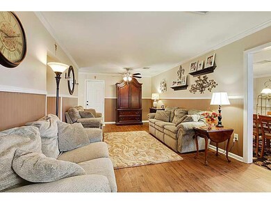 Den/Family/Great Room. Den has laminate wood floor