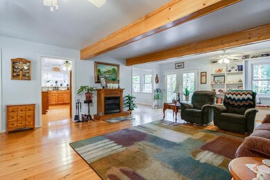 Family room opens into kitchen and eat-in kitchen.  Great layout for entertaining, and room outside on the deck or wrap-around porches.