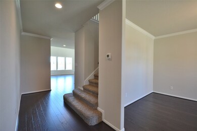 As we enter into the Main Living Area you will be welcome by the amazing Two Story Grand Living Area with Walls of Windows!