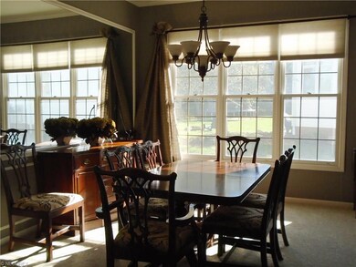 Formal dining with crown molding and freshly paint
