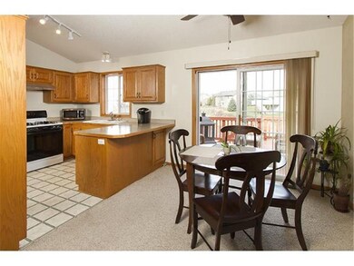 Informal dining leading into the kitchen.