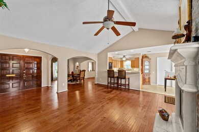 vaulted ceilings with fans in each room
