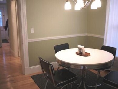 Separate dining room provides a more...
