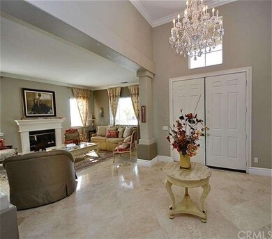 Grand entryway with double doors