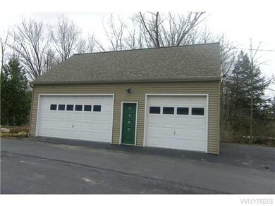 Parking Lot/Garage Large  3 car garage with loft a