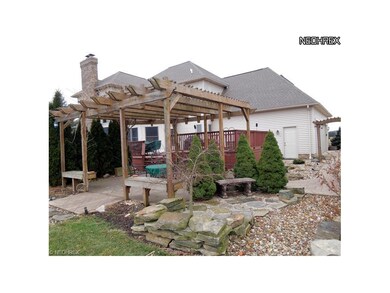 Stamped Patio with Pergola off Deck with Sunken Ho