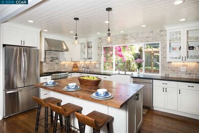 Walnut topped island, Quartzite countertops, Therm