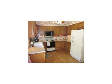 Kitchen. Kitchen is roomy and has ample cabinets