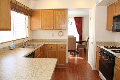 Kitchen w/Rich Wood Cabinet & Appliances