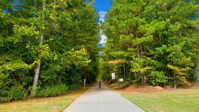 View of home's community featuring a yard