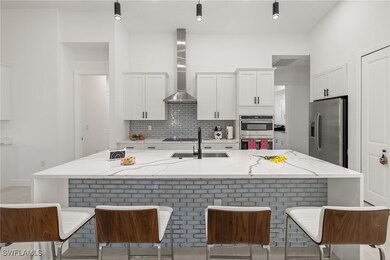 Kitchen featuring appliances with stainless steel