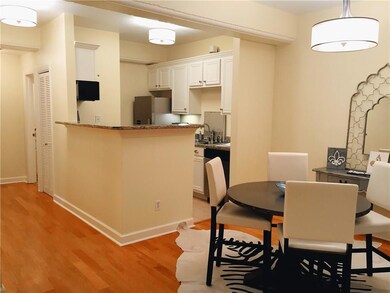 LOVELY DINING AREA OPEN TO KITCHEN AND DEN WITH 2