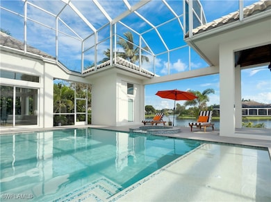 View of pool featuring a patio area, a lanai, a po