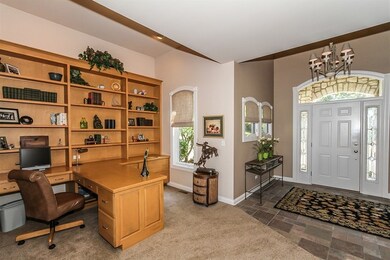 THE OFFICE HAS A BUILT IN DESK AND BOOK CASES