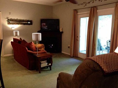 Living Room. Open floor plan living room has a coz